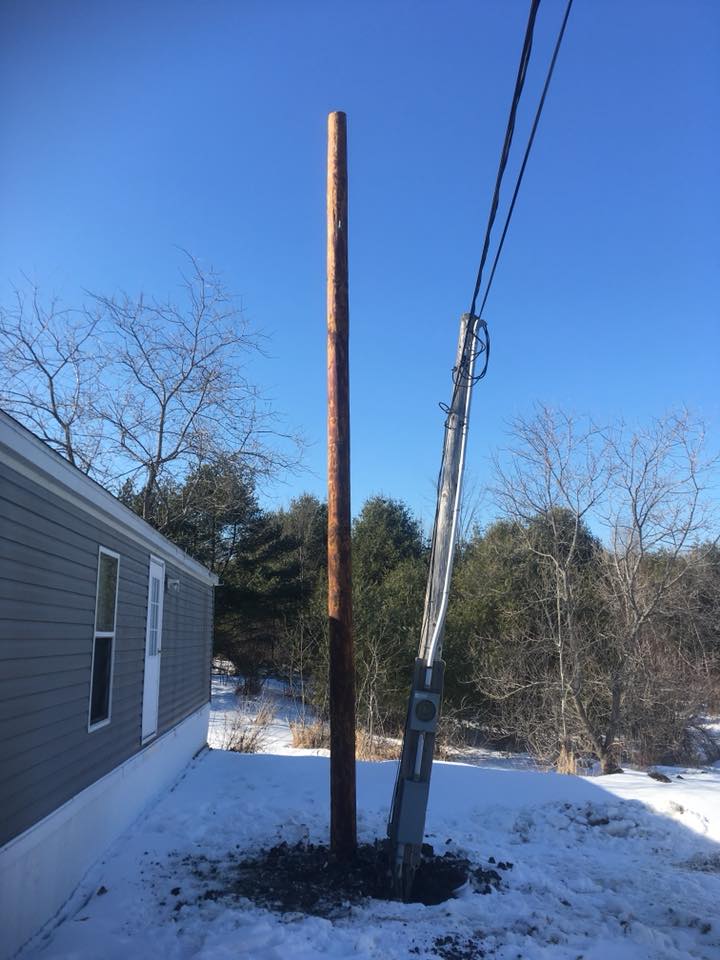 replacing old power line pole